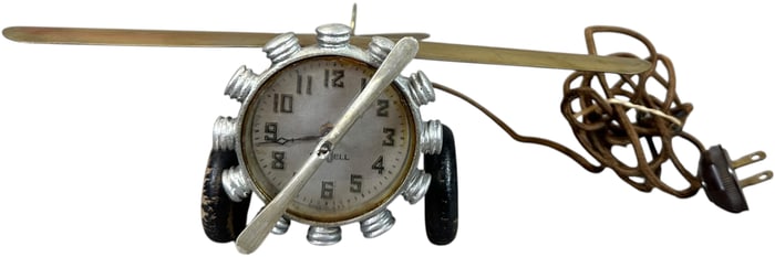 1930S AIRPLANE ELECTRIC CLOCK