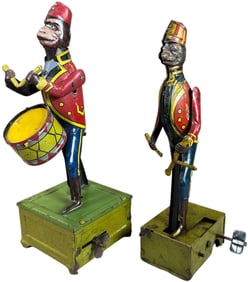 TWO DISTLER MONKEY DRUMMER VERSIONS