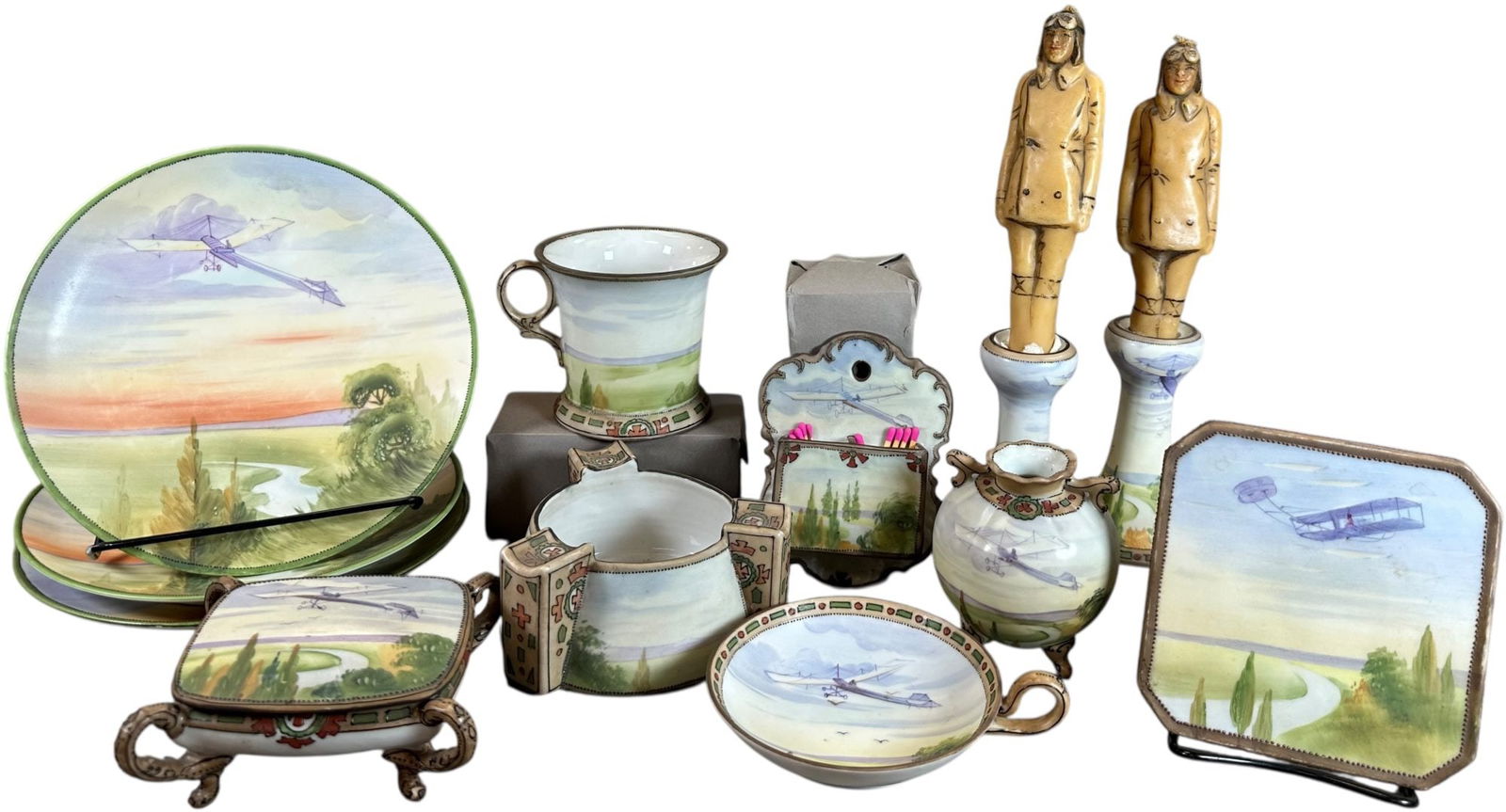 HANDPAINTED NIPPON AVIATION THEME CHINA: 553. HANDPAINTED NIPPON AVIATION THEME CHINA | From the David Bausch Automobilia collection. | 8" dia plate | (Pristine to Near Mint Condition) | $400 - $800