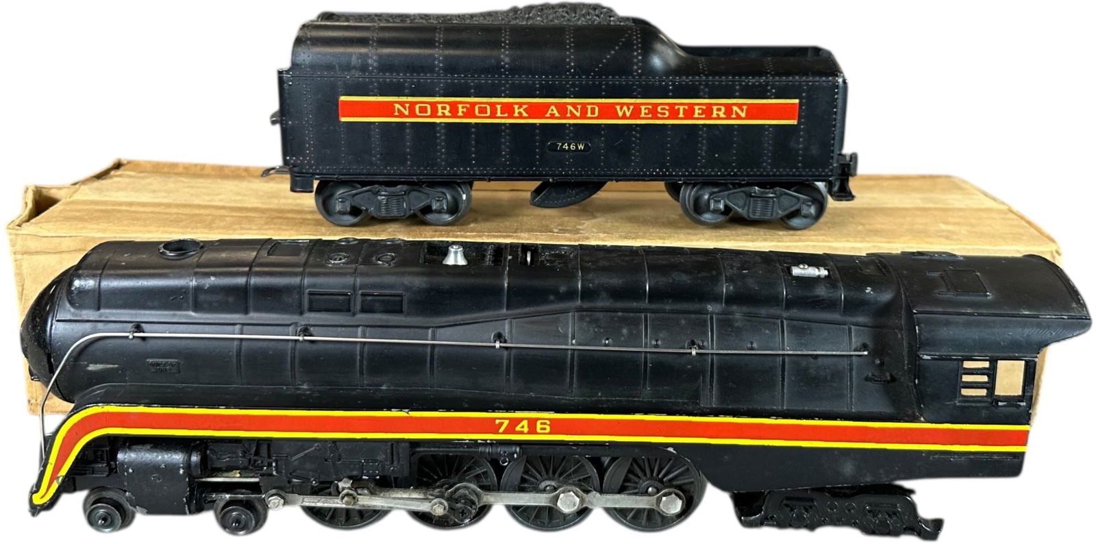POSTWAR LIONEL 746 N&W J LOCOMOTIVE: 387. POSTWAR LIONEL 746 N&W J LOCOMOTIVE | Postwar, electric, o gauge. | 12.5" l. loco | (Excellent Condition) | $400 - $700