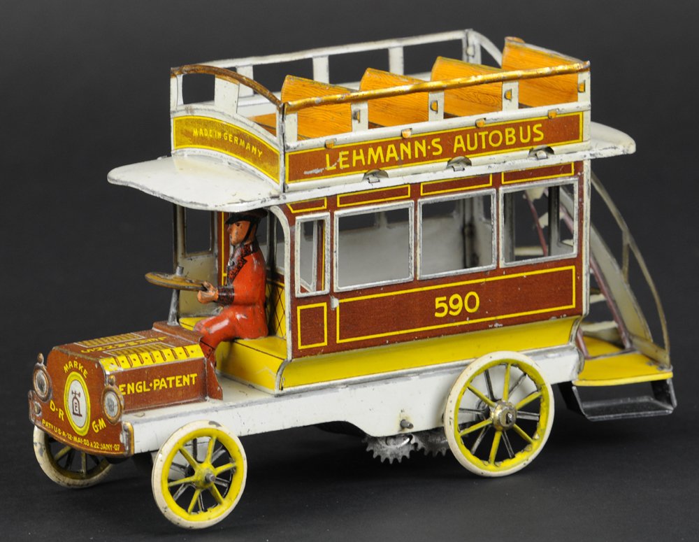 LEHMANN DOUBLE DECKER BUS (AUTOBUS - BROWN): Germany, lithographed tin double decker bus, clockwork driven, features open rail roof and rear stairwell, 7"l.