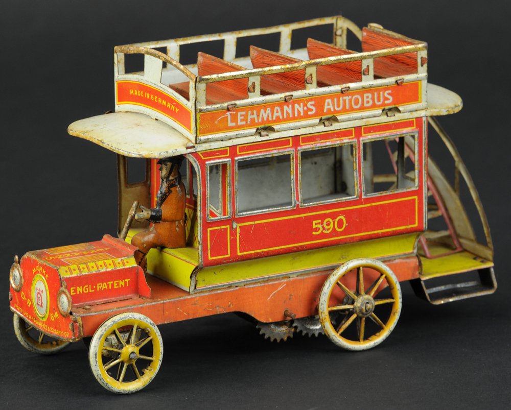 LEHMANN AUTOBUS (RED): Germany, red lithographed version, double decker bus with open bench seating, rear stairway, seated driver, clockwork driven. 7" l.