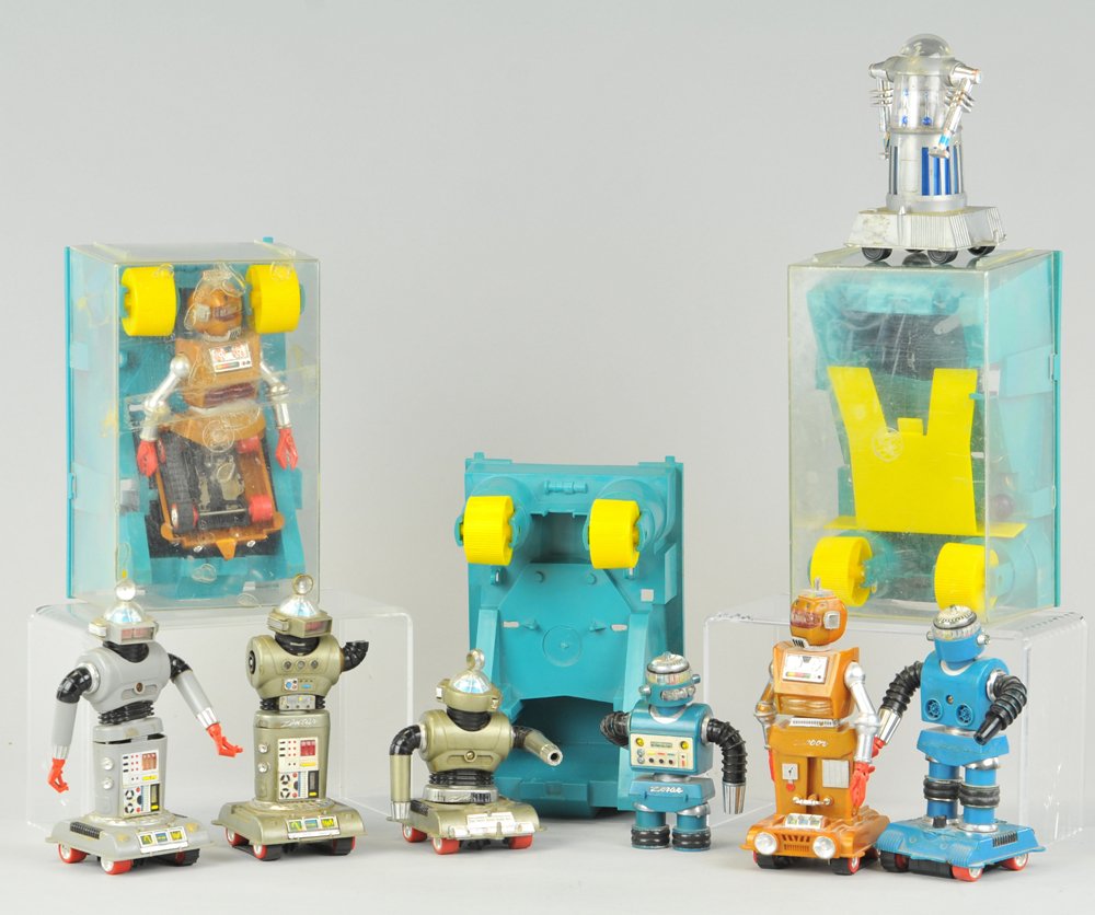 GROUPING OF ROBOT IDEAL TOYS: Ideal, an as-is lot of robots, most missing parts or having broken pieces, includes: Zobar, Zerak, and Zinter, includes three blue roller covers. 4 1/2" to 6 1/2" h.