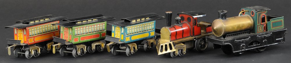 O' GAUGE TIN LITHO TRAIN SET: Germany, very colorful passenger set includes red locomotive with integral tender, together with three passenger coaches, each featuring clerestories and multi-windows at body. 23" overall length.