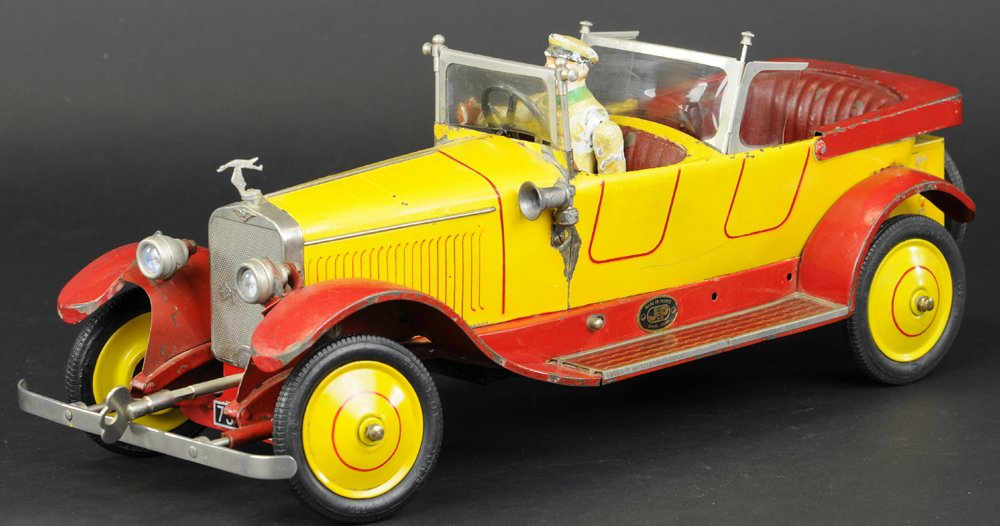 JEP HISPANO SUIZA: France, great styling, luxury auto done in tinplate, painted in yellow and red, dual windshields, clockwork mechanism, full appointments, radiator ornament, rubber tires, disc wheels. 18 1/2" l.