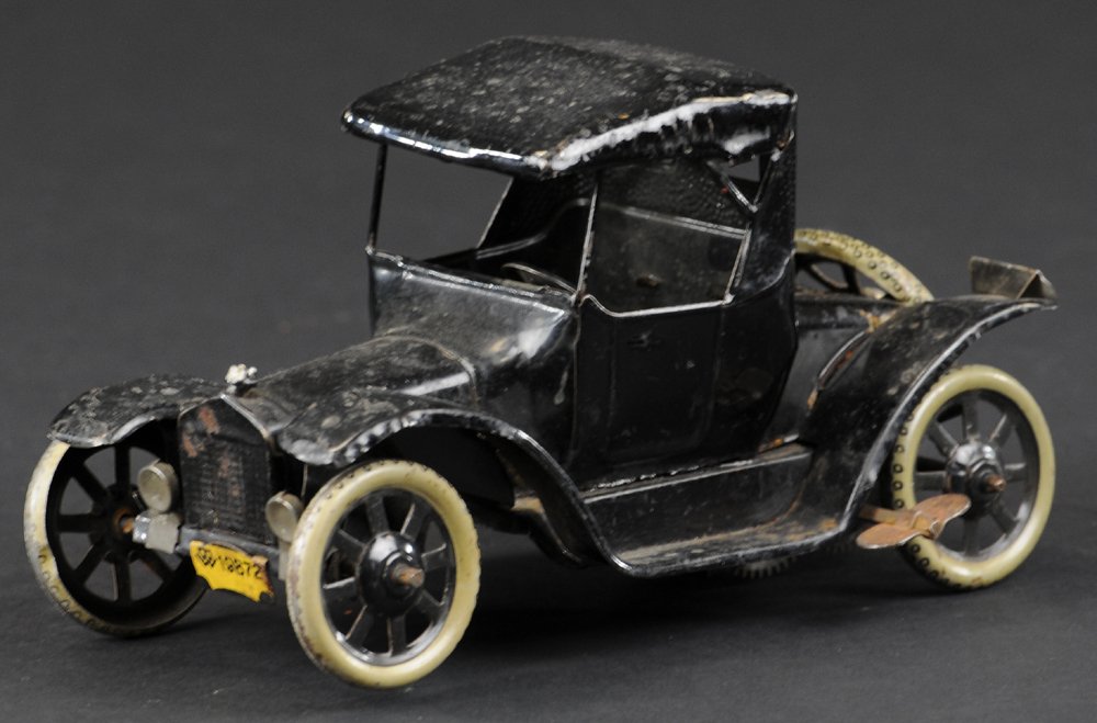 BING COUPE: Germany, black tin lithography, spare on trunk, spoke wheels, wind-up action. 6" l.