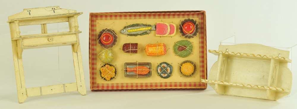 MINIATURE KITCHEN SHELVES & BOXED FOOD: Includes two large hanging kitchen shelves w/food in original box, twelve pieces of plastered food tied down in box, food retains bright colors. Largest kitchen shelf 7 3/4" h. x 6" w.
