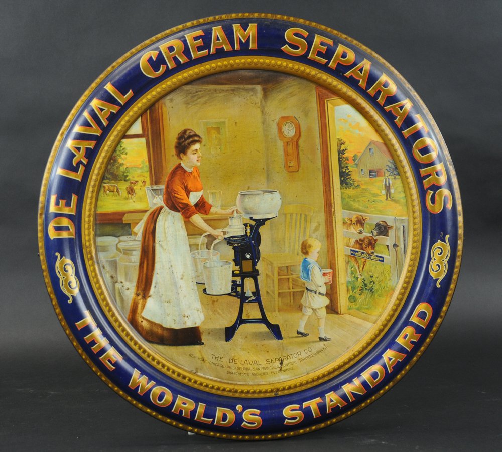 LARGE DE LAVAL TIN SIGN: Large round tin litho sign for "De Laval Cream Separators, The World's Standard," great graphic image at center, depicts woman and child at separator machine, embossed self frame. 26"