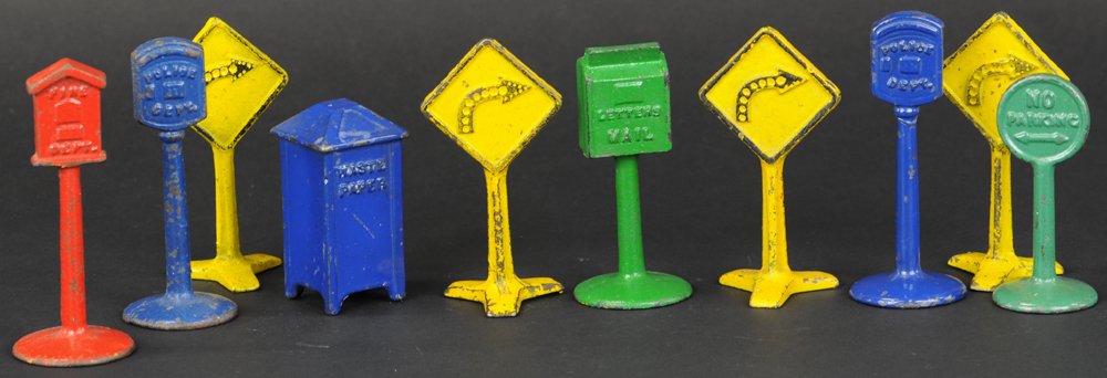 GROUPING OF ROAD SIGNS & STREET ACCESSORIES: Kilgore and Arcade signage together with blue water paper bin, green mailbox, and red fire call box, assorted colors, curve signs painted in yellow. 3 3/4" to 4" l.
