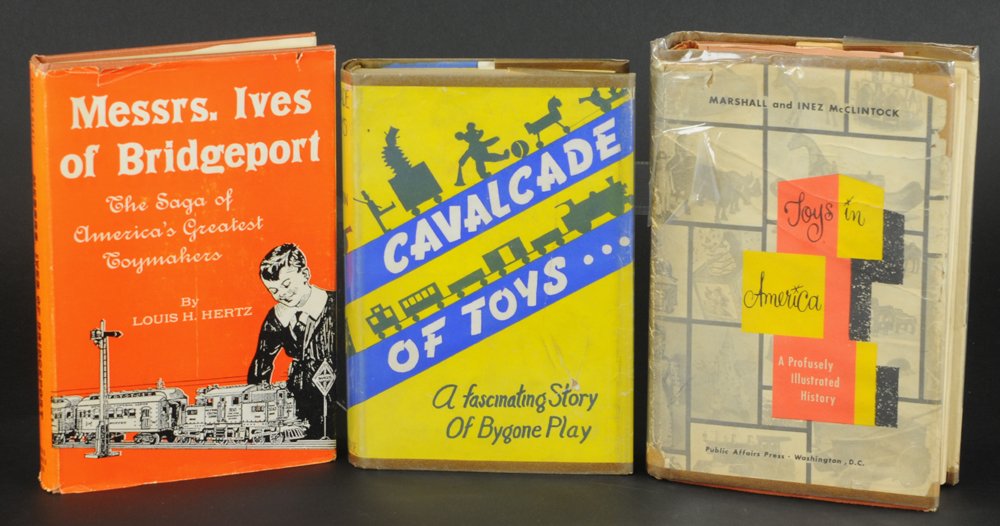 LOT OF THREE TOY REFERENCE BOOKS: Includes: Louis Hertz, "Messrs. Ives of Bridgeport," Marshall and Inez McClintock, "Toys in America," and Freeman, "Cavalcade of Toys," book. All hardcover with dust jackets.