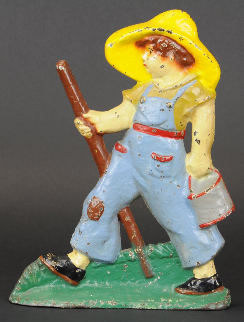 HUCKLEBERRY FINN DOORSTOP: Littco Products, great depiction of Mark Twain's famous literary character, bright & vivid colors, wedge back. 12 3/8" h.