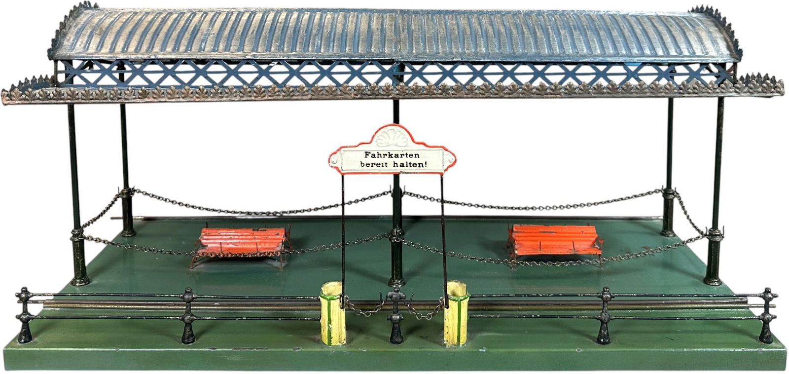 MARKLIN PASSENGER STATION PLATFORM WITH CANOPY: 61. MARKLIN PASSENGER STATION PLATFORM WITH CANOPY | Hand painted, adjustable track to accommodate multiple gauges, catalog no.2042. | 21 x 10" lw | Some resolder to the framework of authentic canopy,