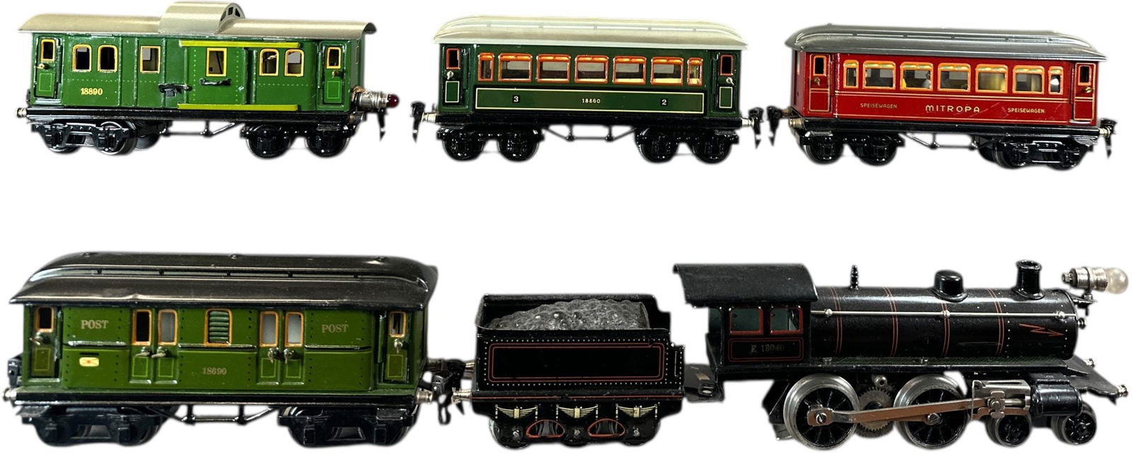 MARKLIN CONTINENTAL OUTLINE PASSENGER SET: 133. MARKLIN CONTINENTAL OUTLINE PASSENGER SET | O gauge, electric, cars have interiors. | 10" l. loco | Repainting to front of loco above buffers, set is overall (Excellent to Pristine Condition) | $