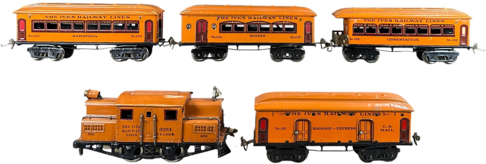 IVES RUBBER STAMPED SARATOGA PASSENGER SET: 221. IVES RUBBER STAMPED SARATOGA PASSENGER SET | O gauge, electric. Ex: Ward Kimball Collection. | 8.5" l. | Bright paint! Postal car roof appears to be overpainted or married, (Pristine to Near Mint