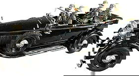 TIPPCO MERCEDES WITH LINEOL PASSENGERS: 318. TIPPCO MERCEDES WITH LINEOL PASSENGERS | Original black TippCo Mercedes with working clockwork motor plus four original seated Lineol figures. | 9" l. | Figures not original to car, but very appr