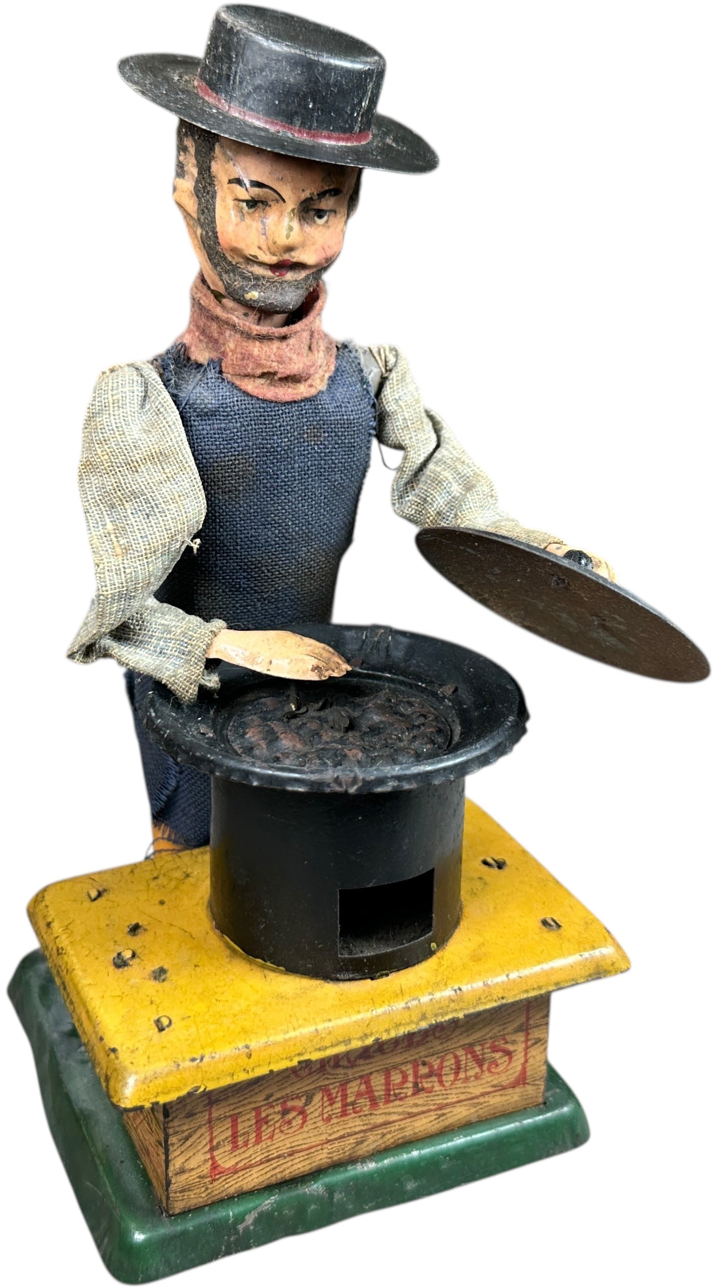 FERNAND MARTIN CHESTNUT VENDOR: 332. FERNAND MARTIN CHESTNUT VENDOR | France, circa 1912, wind-up motor, "Chauds Les Marrons," this is the first toy to come out of the Georges Flersheim factory, when toy is activated the vendor spin