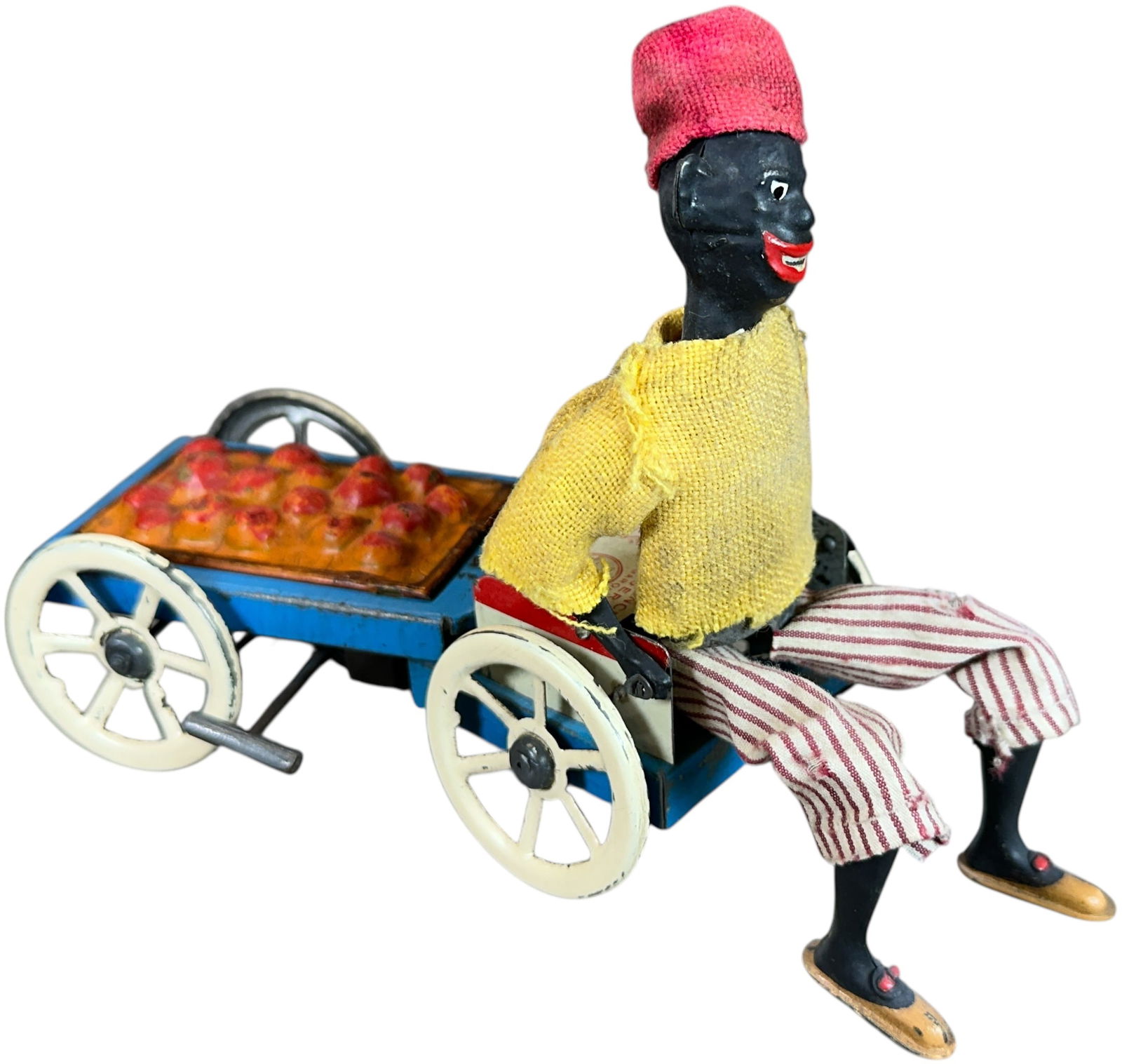 FERNAND MARTIN ORANGE VENDOR: 350. FERNAND MARTIN ORANGE VENDOR | France, circa 1910, wind-up motor, "L'Autopatte." | 7 " l. | Wheels are repainted, otherwise (Excellent to Pristine Condition) | $600 - $1,000