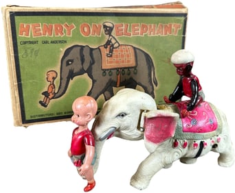 BOXED CELLULOID HENRY ON ELEPHANT