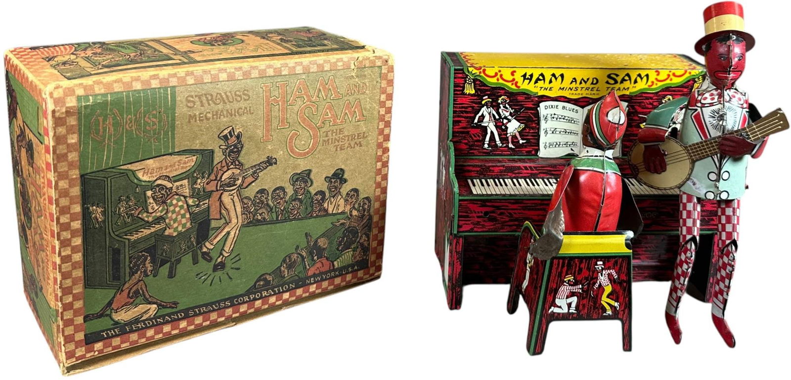 BOXED STRAUSS HAM & SAM: 393. BOXED STRAUSS HAM & SAM | USA, working wind-up motion. Provenance: Richard Mueller Collection. | 7" l. | Small tear to lid of box, (Excellent to Pristine Condition) | $400 - $700