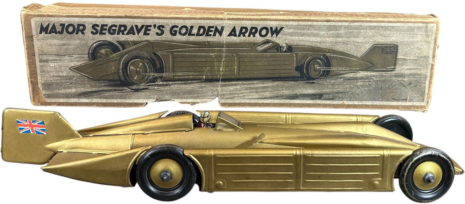 BOXED GUNTHERMANN GOLDEN ARROW RACER: 1047. BOXED GUNTHERMANN GOLDEN ARROW RACER | Germany, wind-up motor driven. A desirable streamlined model of Major Seagraves 327 mph world's record holder of 1929, similar styling to that of the Kings