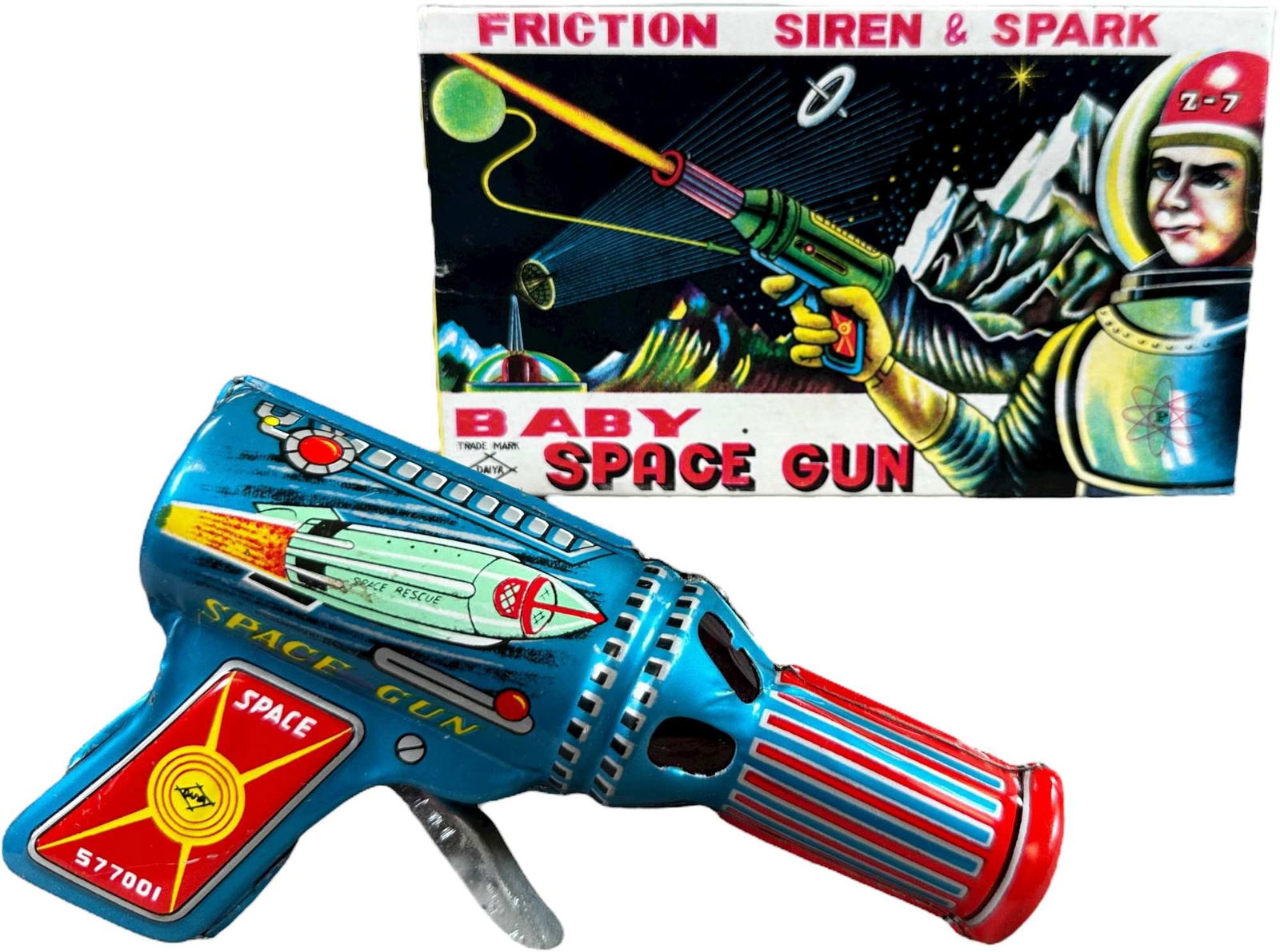 BOXED DAIYA BABY SPACE GUN: 1071. BOXED DAIYA BABY SPACE GUN | Japan. | 5.5" l. | Still sparking and emitting siren noise, (Pristine to Near Mint Condition) | $100 - $200