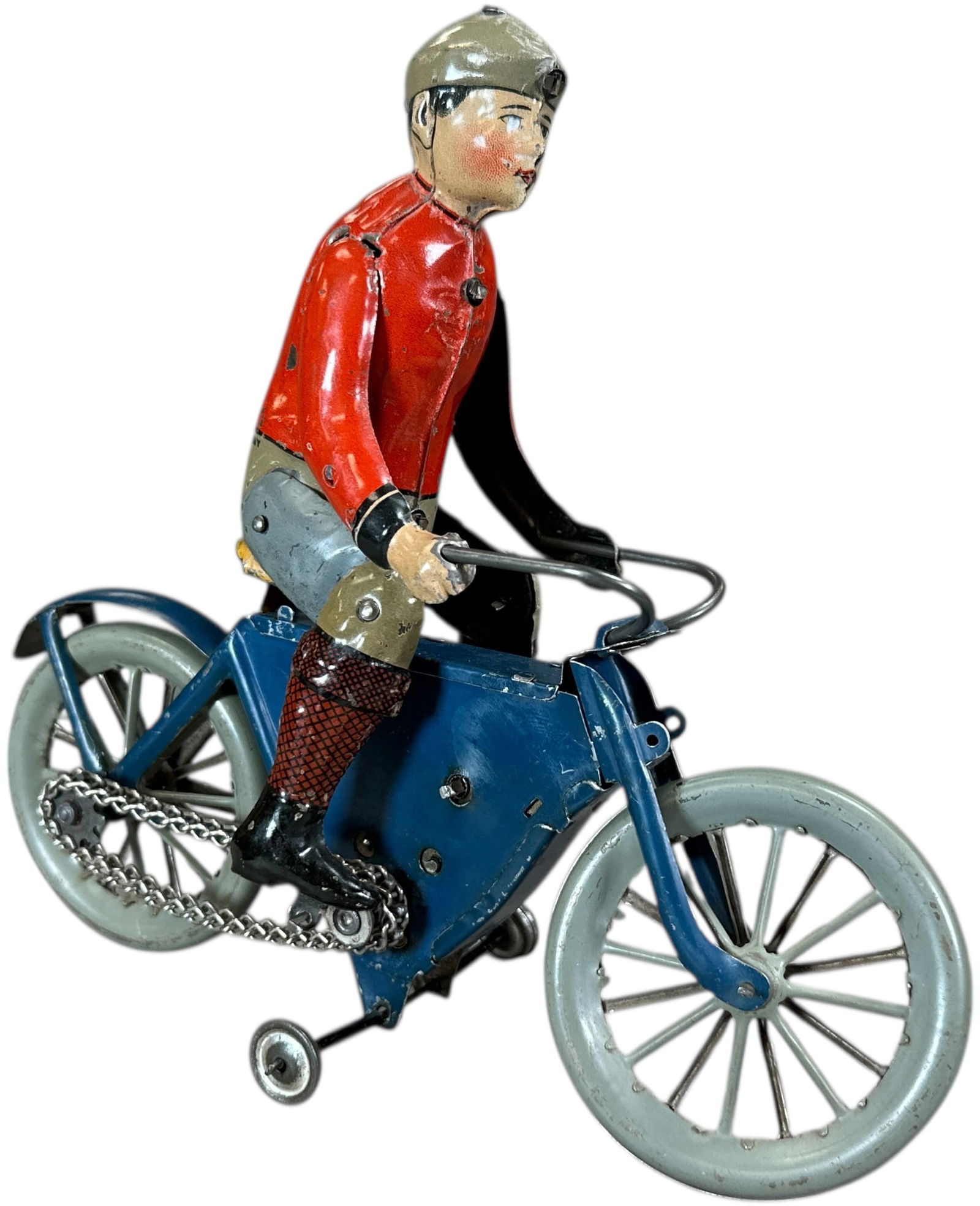 GUNTHERMANN BOY ON PEDAL MOTORCYCLE: 1128. GUNTHERMANN BOY ON PEDAL MOTORCYCLE | Germany, wind-up motor driven. This scarcer example is not commonly found in this color outfit of red shirt with multicolor pants/socks, | 8.5" l. | Above a