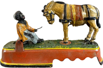 SPISE A MULE - BOY ON BENCH MECHANICAL BANK