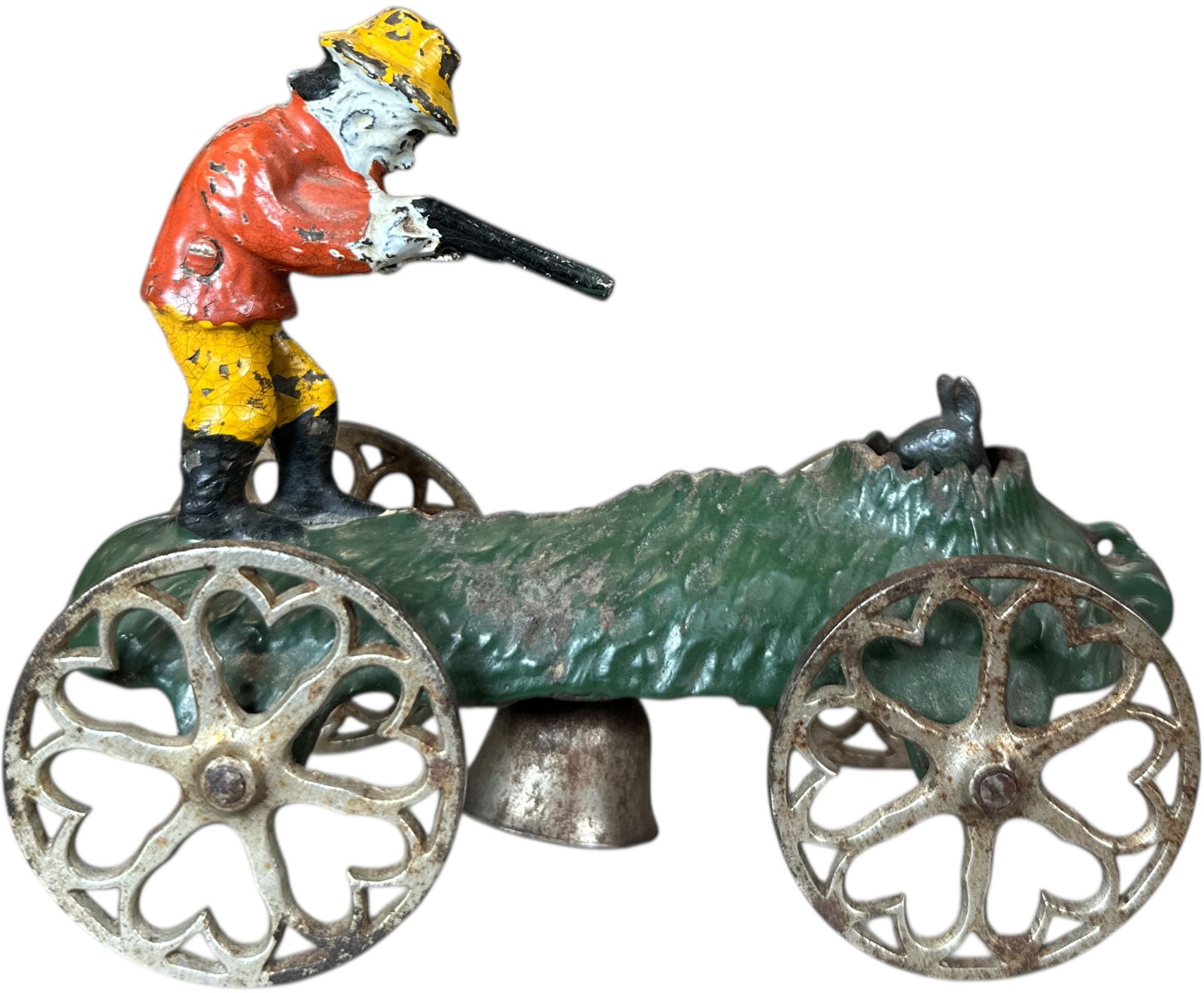NN HILL RABBIT HUNTER BELL TOY: 1285. NN HILL RABBIT HUNTER BELL TOY | As toy rolls the rabbit pops up and down his hole as the bell rings. Provenance: Richard Mueller Collection. | 6" l. | (Excellent Condition) | $1,000 - $1,800