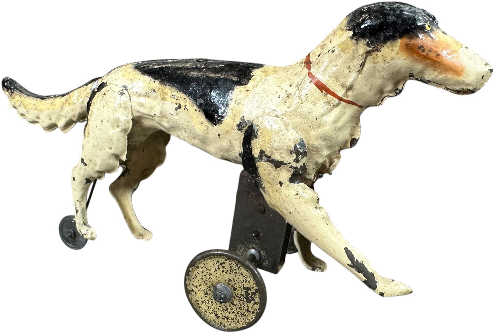 GERMAN TIN WALKING WOLFHOUND DOG: 119. GERMAN TIN WALKING WOLFHOUND DOG | Germany, attributed to Gunthermann, wind-up motor. | Provenance: The Maloy Collection. | 8.5" l. | In surprisingly well preserved (Excellent Condition) | $400 -