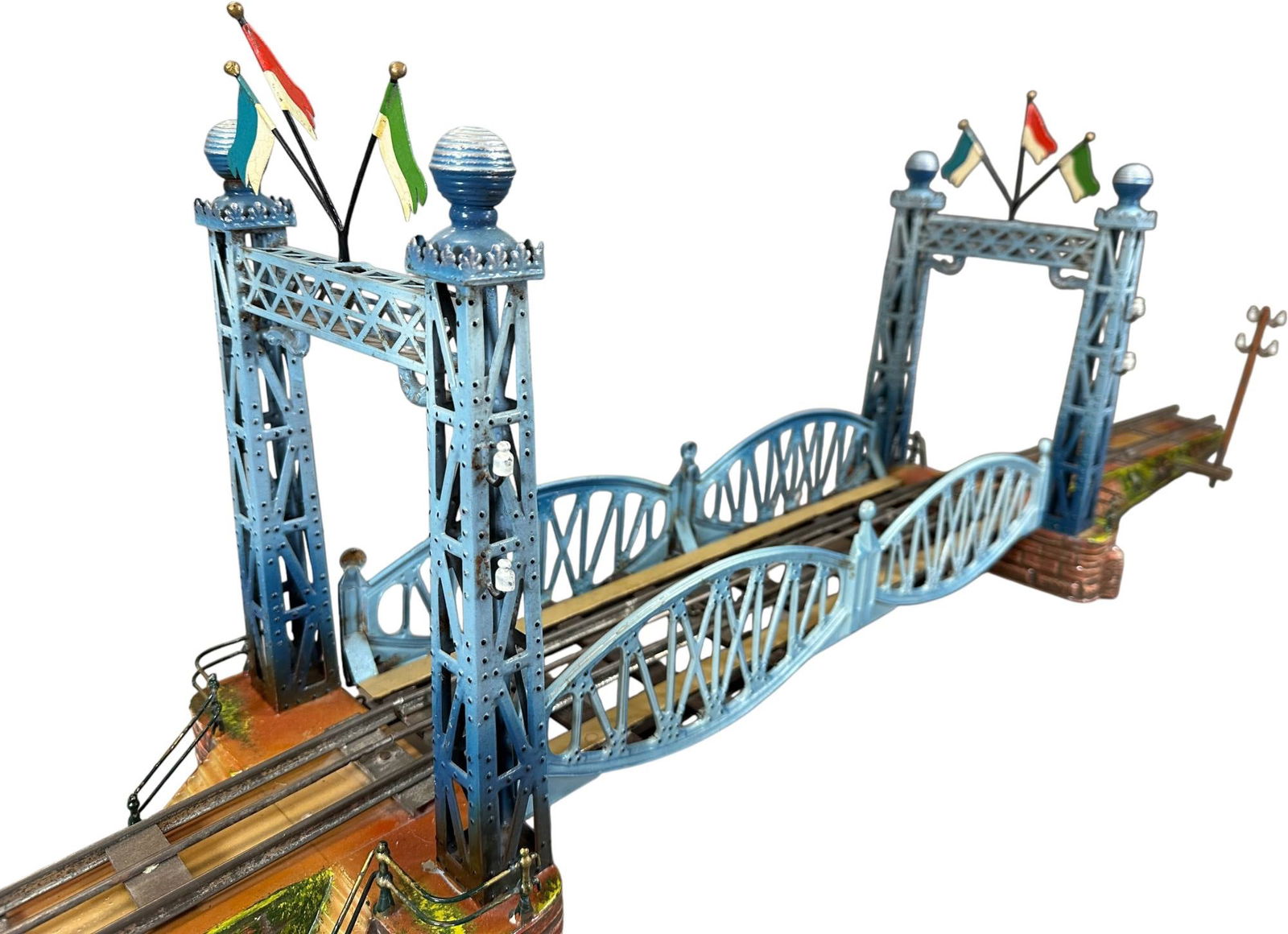 MARKLIN TOWER BRIDGE: 289. MARKLIN TOWER BRIDGE | Gauge 1, hand painted. | Provenance: The Maloy Collection. | 80" l. | Telegraph towers reattached to ramps, replaced flags, otherwise (Pristine Condition) | $3,000 - $6,000