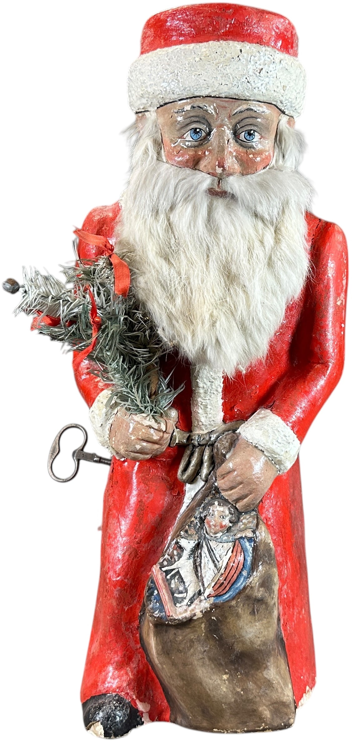 EARLY CLOCKWORK NODDING SANTA: 19. EARLY CLOCKWORK NODDING SANTA | Paper mache composition with fur beard, clockwork mechanism is mounted on inside to cause head nodding. Provenance: Ed & Brenda DeGarbolewski Collection. | 18" h. |
