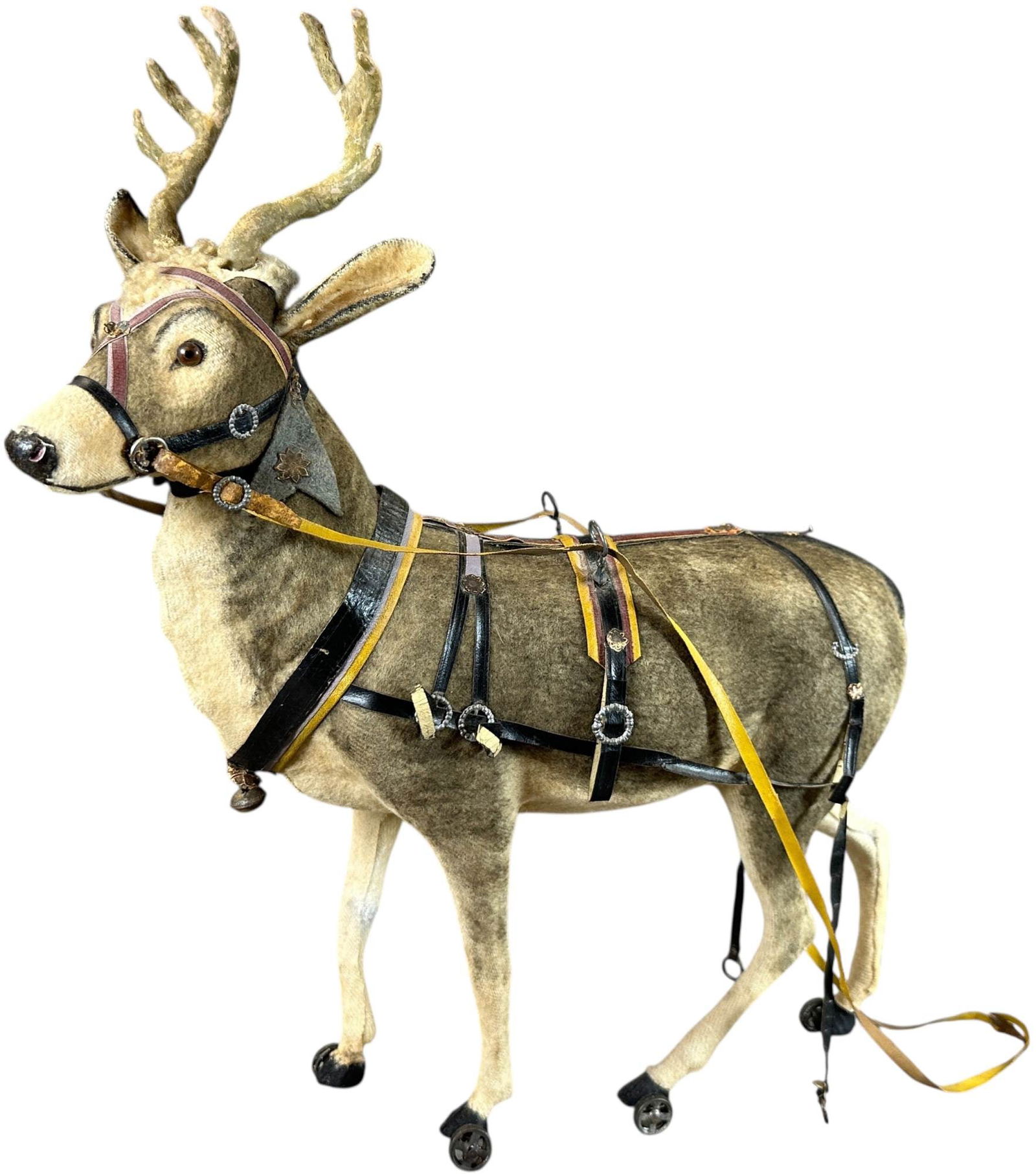 LARGE REINDEER ON WHEELS: 21. LARGE REINDEER ON WHEELS | Very large impressive deer with great detail, fur covered body. Provenance: Ed & Brenda DeGarbolewski Collection. | 16" h. | Nice trappings are still intact, (Excellent