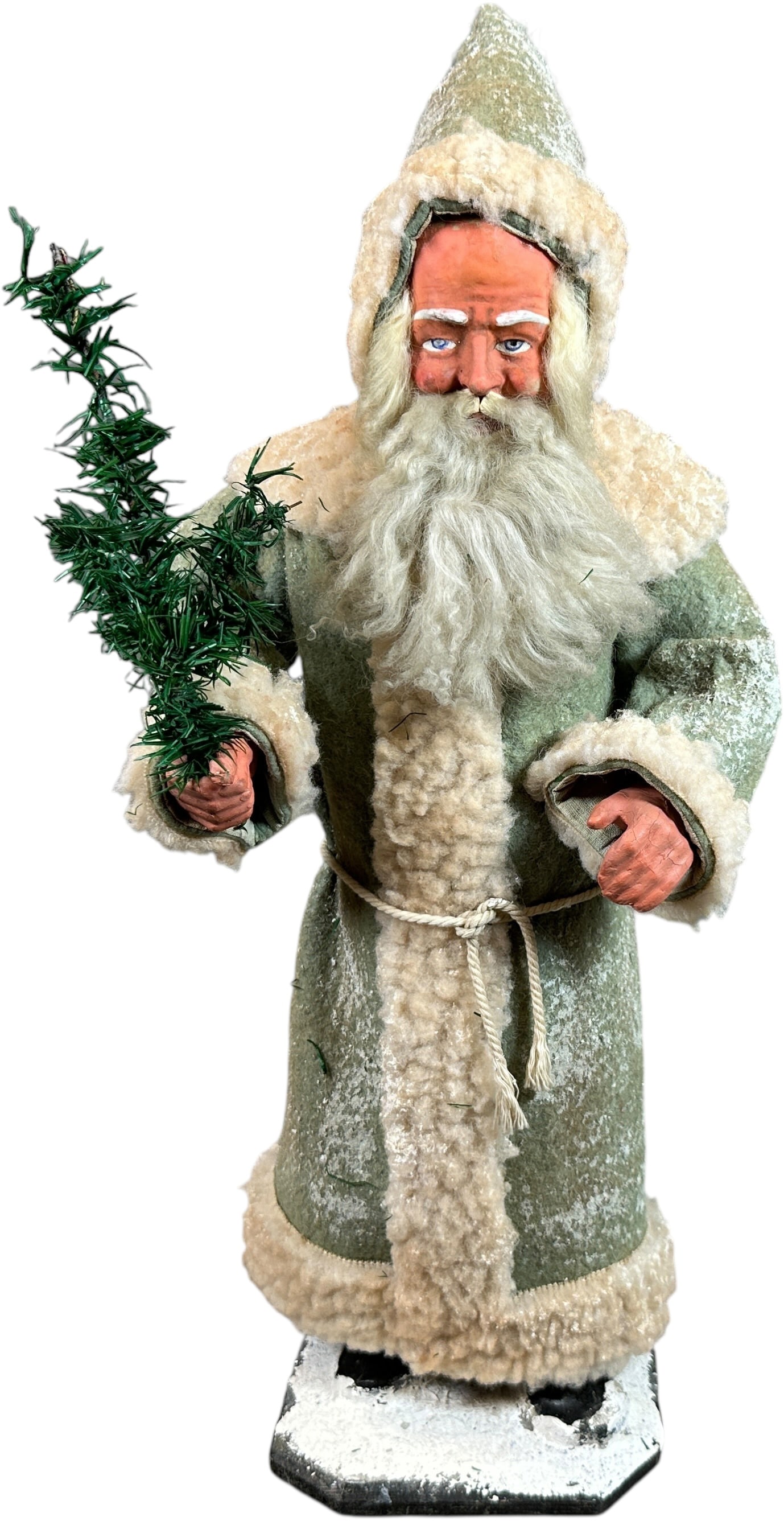 HANDSOME FATHER CHRISTMAS CANDY CONTAINER: 26. HANDSOME FATHER CHRISTMAS CANDY CONTAINER | Harder to find with green coat, large size candy container with a stern facial expression. | 20.5" h. | Some paint enhancements to crazed hands, otherwi