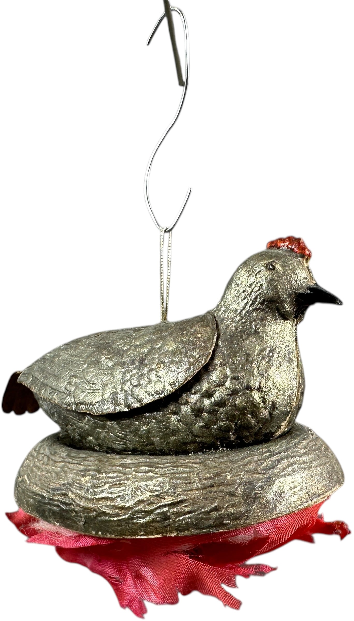 DRESDEN HEN ON A NEST ORNAMENT: 39. DRESDEN HEN ON A NEST ORNAMENT | Silk candy bag is torn. Provenance: Jerry & Darla Arnold Collection. | 2.5" l. | (Excellent Condition) | $1,000 - $1,600