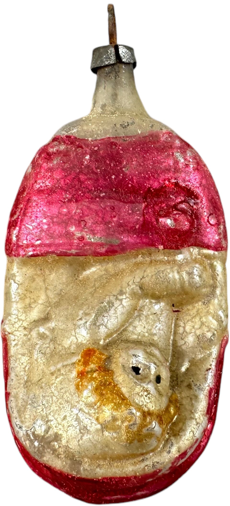 BABY IN CARRIAGE GLASS ORNAMENT: 42. BABY IN CARRIAGE GLASS ORNAMENT | Some crackling on surface. | 2.5" h. | Minor paint loss, (Excellent Condition) | $300 - $600