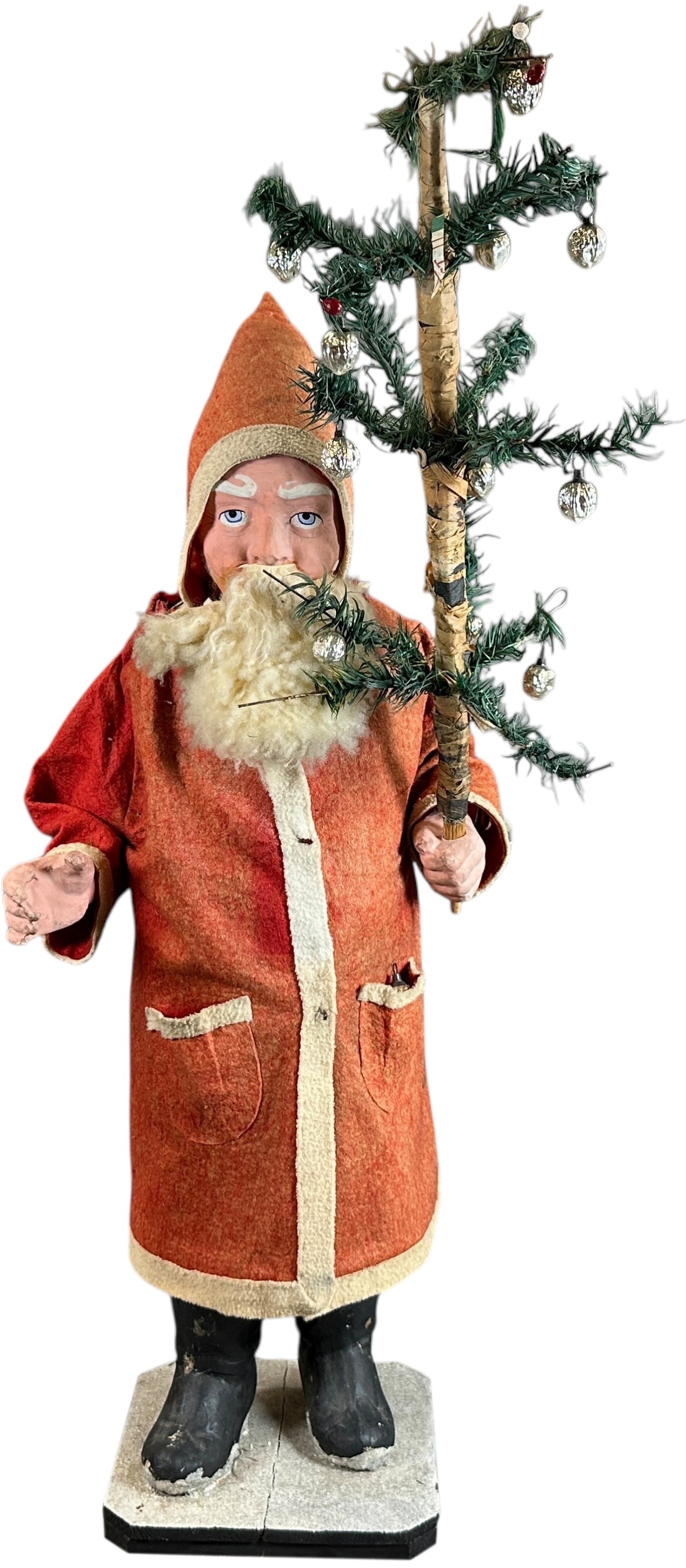 TALL SANTA W/ FEATHER TREE CANDY CONTAINER: 70. TALL SANTA W/ FEATHER TREE CANDY CONTAINER | Huge Santa figure with great face and detail. Provenance: Beth Karp Collection. | 29" h. | Age related patina, (Excellent Condition) | $2,000 - $3,500