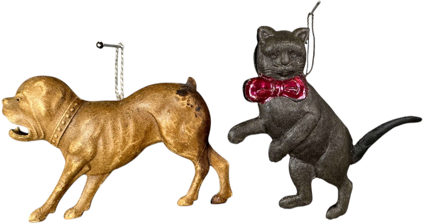 DRESDEN CAT & DOG ORNAMENT: 96. DRESDEN CAT & DOG ORNAMENT | Some staining on the rear of the dog. Provenance: Jerry & Darla Arnold Collection. | 3.5" l. | (Excellent Condition) | $500 - $900