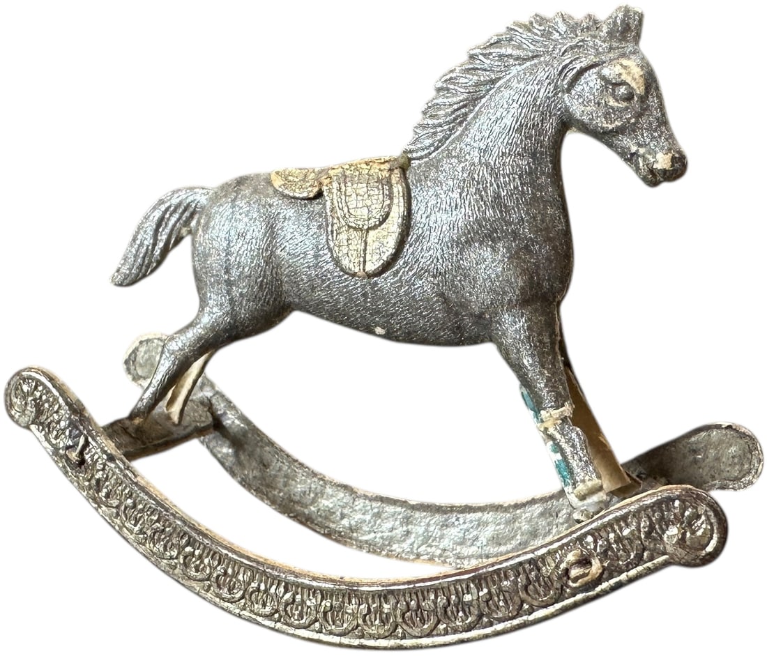 DRESDEN ROCKING HORSE ORNAMENT: 134. DRESDEN ROCKING HORSE ORNAMENT | This is a scarce ornament. Provenance: Bob & Maurine Young | 4" l. | Some minor flaking, old support repair to front legs, (Excellent Condition) | $800 - $1,600