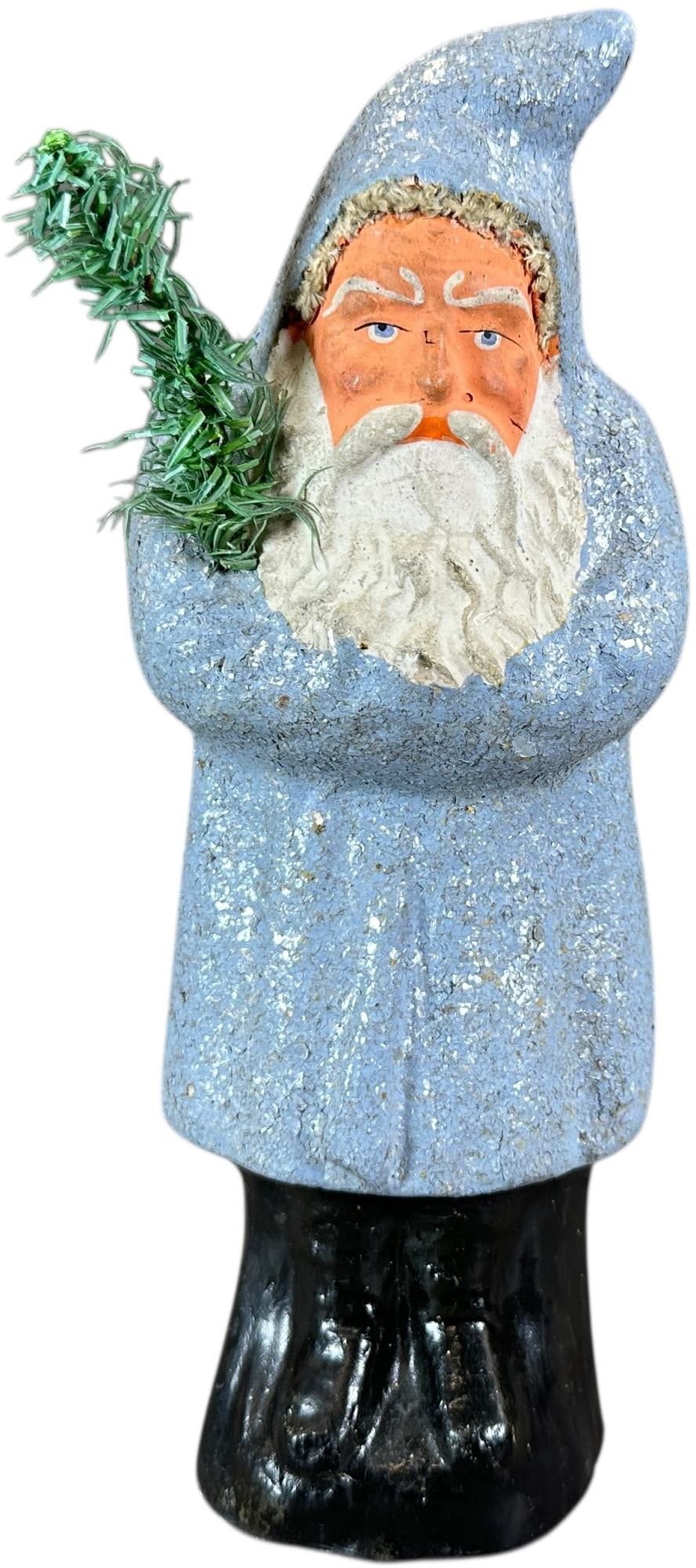 LIGHT BLUE FLECKED COAT BELSNICKEL: 162. LIGHT BLUE FLECKED COAT BELSNICKEL | An imposing piece marked Germany. | 10" h. | Face is original, coat and boots possibly overpainted, (Excellent Condition) | $800 - $1,400