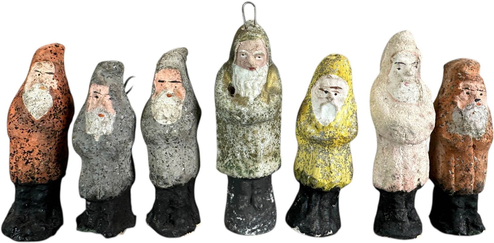 SEVEN SMALL COMPOSITION BELSNICKLES: 180. SEVEN SMALL COMPOSITION BELSNICKLES | Great to hang on a small feather tree. Provenance: Bob & Maurine Young | 3" l. | (Excellent Condition) | $700 - $1,400