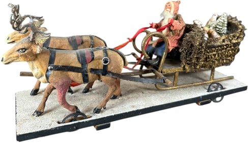 SANTA IN LOOFAH SLEIGH PULLED BY TWO REINDEER