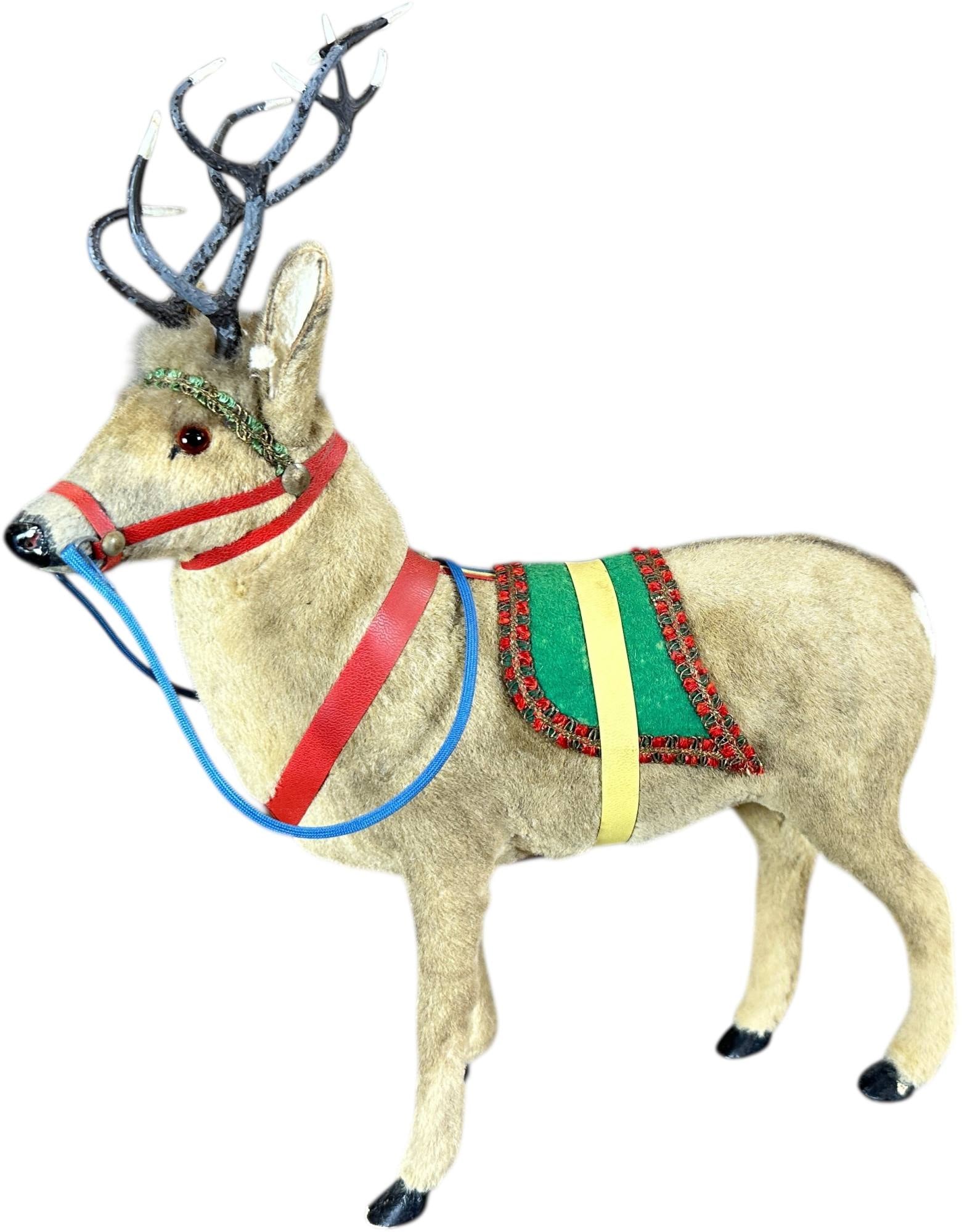 FUR COVERED GLASS EYE REINDEER: 205. FUR COVERED GLASS EYE REINDEER | Provenance: Jerry & Darla Arnold Collection. | 13" h. | (Pristine Condition) | $1,000 - $1,600