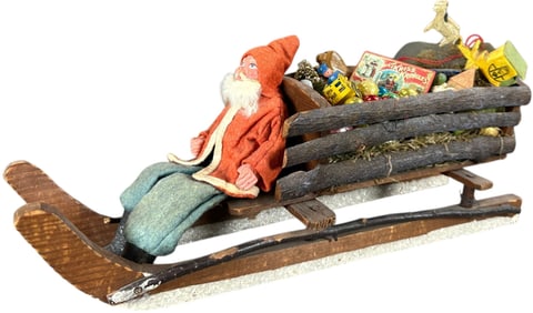 SMALL SANTA CLAUS ON WOOD SLAB SLEIGH