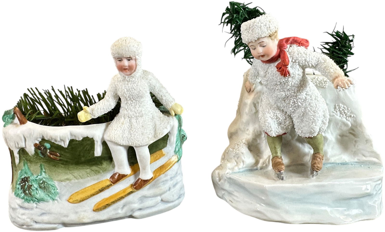 TWO PORCELAIN SNOW CANDY CONTAINERS: 221. TWO PORCELAIN SNOW CANDY CONTAINERS | Nice large winter themed porcelain containers made in Germany. Provenance: Ed & Brenda DeGarbolewski Collection. | 5" h. | (Pristine Condition) | $400 - $800