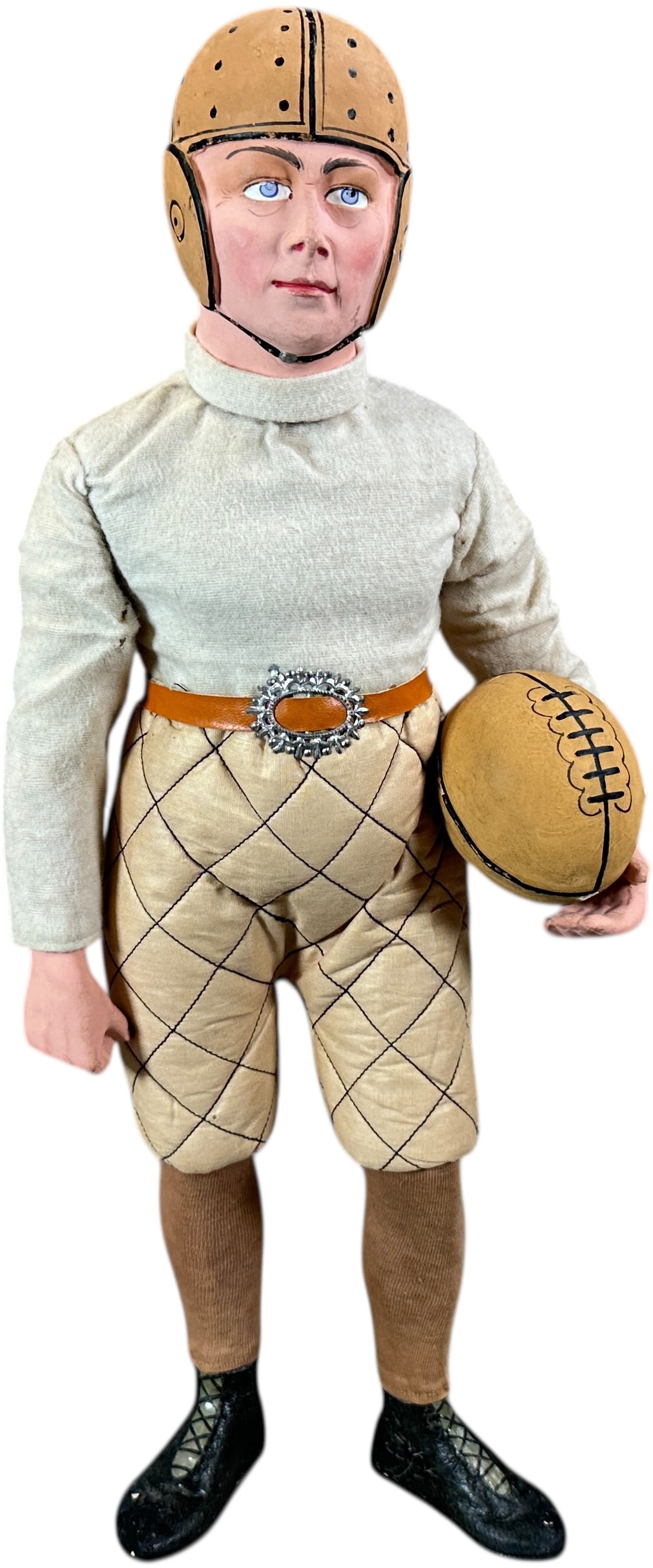 TALL STANDING FOOTBALL PLAYER CANDY CONTAINER: 284. TALL STANDING FOOTBALL PLAYER CANDY CONTAINER | Rare German football candy container, separates at head for candy storage. | 19" h. | Enormous and amazingly preserved with very little touch up at