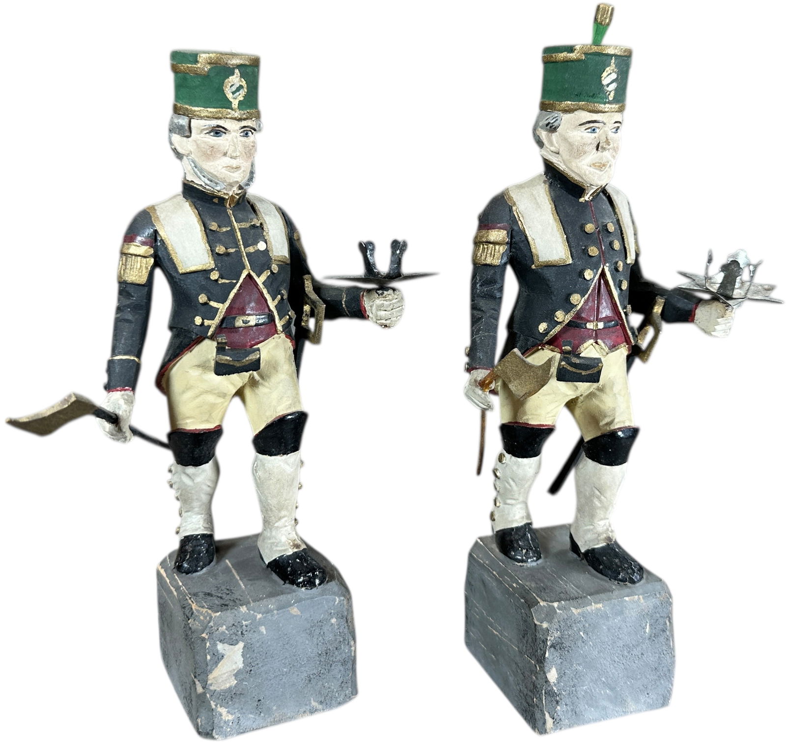TWO ERZGEBIRGE SOLDIER CANDLE HOLDERS: 294. TWO ERZGEBIRGE SOLDIER CANDLE HOLDERS | Smaller German figures. Provenance: Bob & Maurine Young | 8" h. | Tip of one ax is cracked, one soldier missing plume in his hat, overall (Excellent