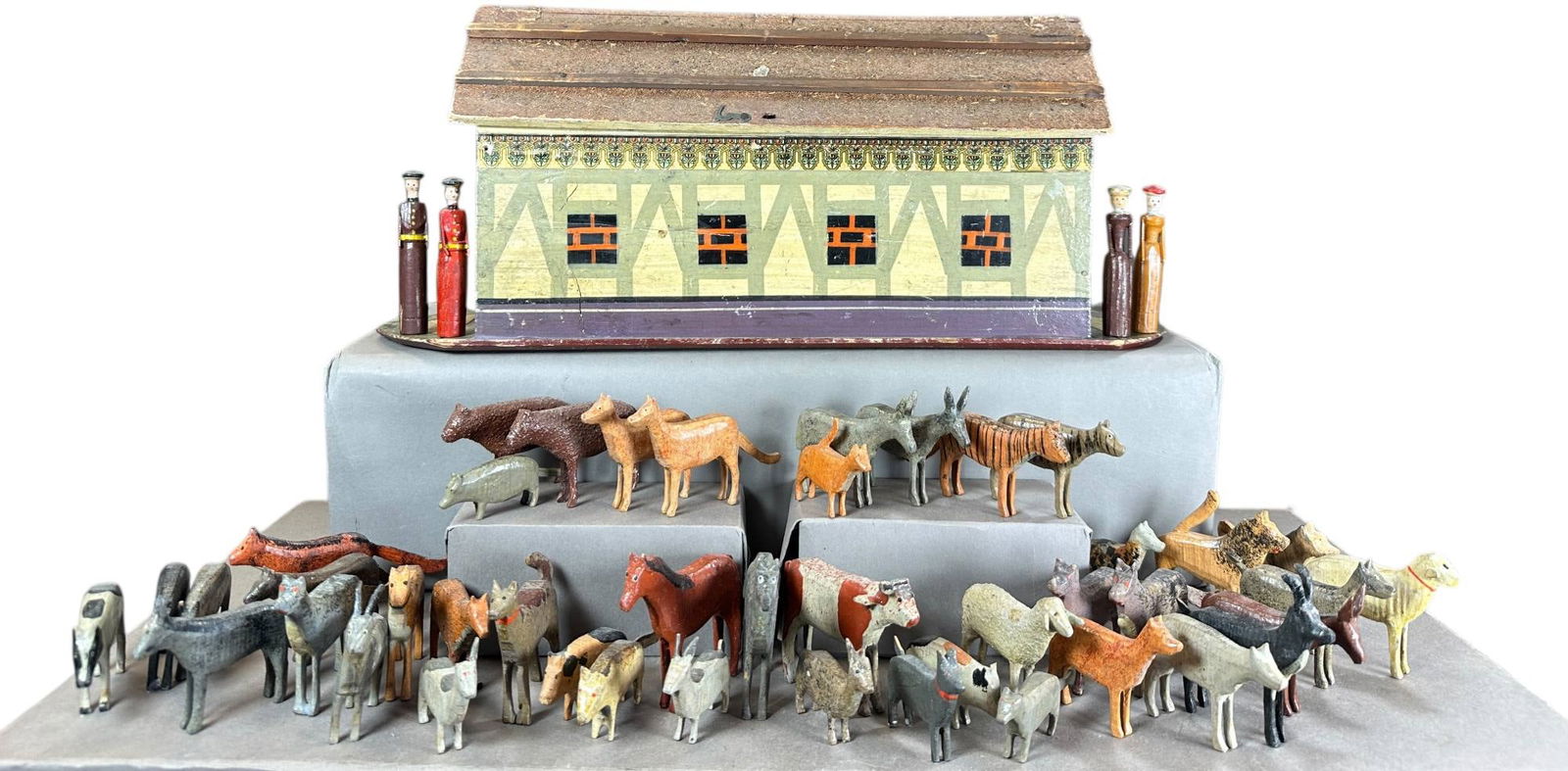 FLAT BOTTOM NOAHS ARK W/ ANIMALS: 301. FLAT BOTTOM NOAHS ARK W/ ANIMALS | Provenance: Bob & Maurine Young | 17.5" l. | Appropriate age related wear and tear to wood, overall (Excellent Condition) | $600 - $900