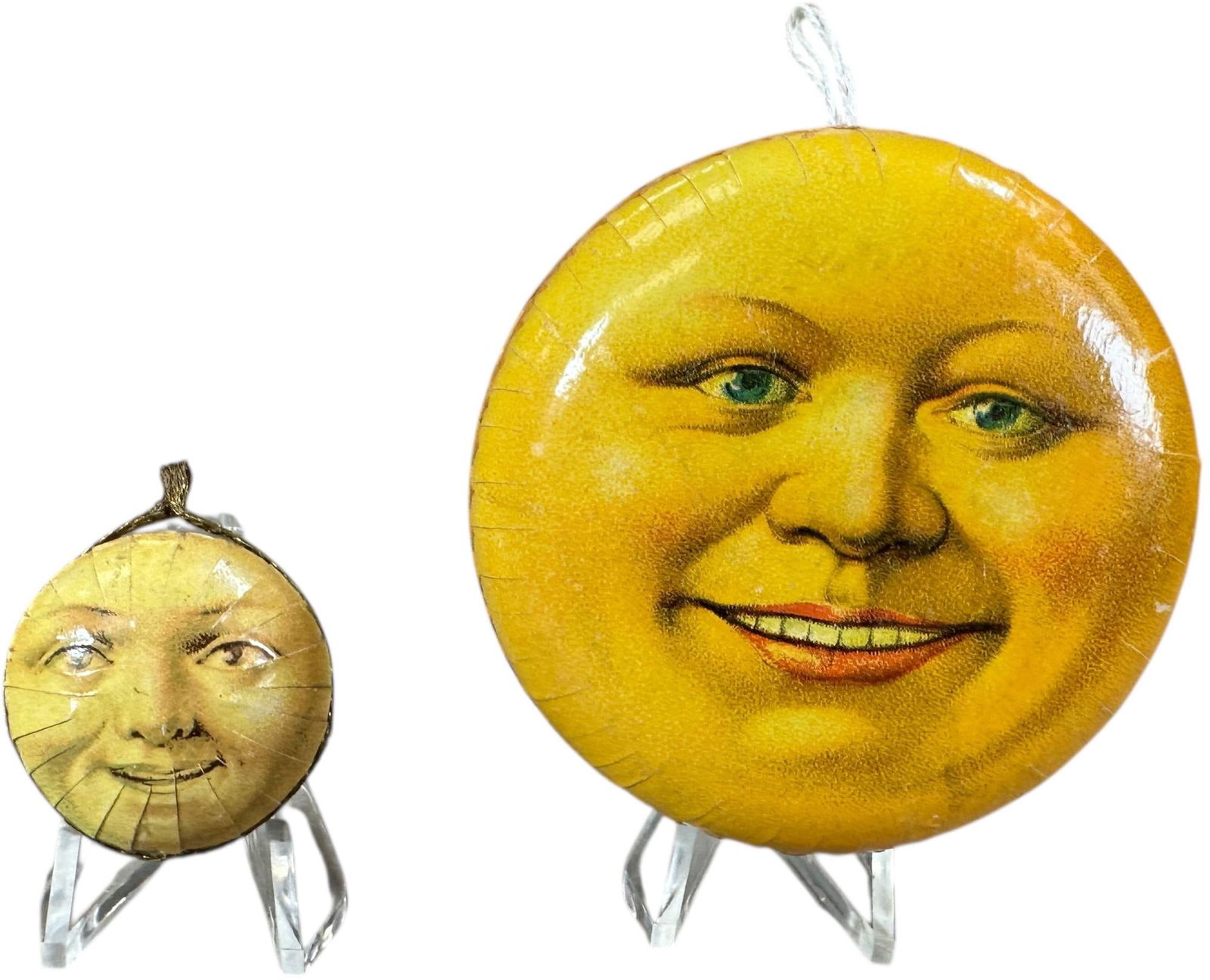 TWO SMALL MOON FACE CANDY CONTAINER: 320. TWO SMALL MOON FACE CANDY CONTAINER | Great moon faces. Provenance: Linda Morrow Collection | 2.5" dia. | (Pristine Condition) | $600 - $1,000