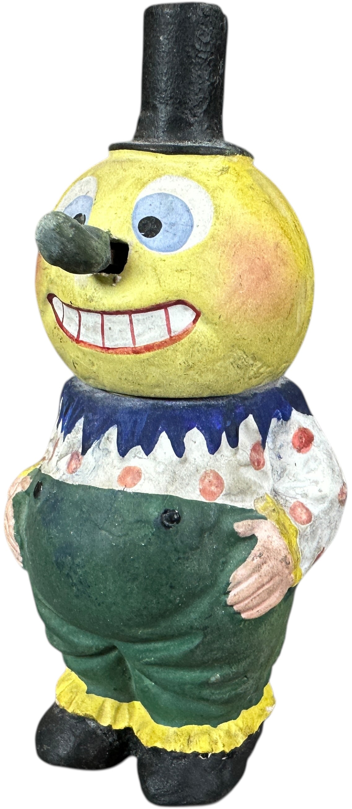 WIGGLY PICKLE NOSE VEGGIE MAN CANDY CONTAINER: 330. WIGGLY PICKLE NOSE VEGGIE MAN CANDY CONTAINER | Rotund clown German candy container. Provenance: Linda Morrow Collection | 6.5" h. | (Excellent Condition) | $600 - $1,200