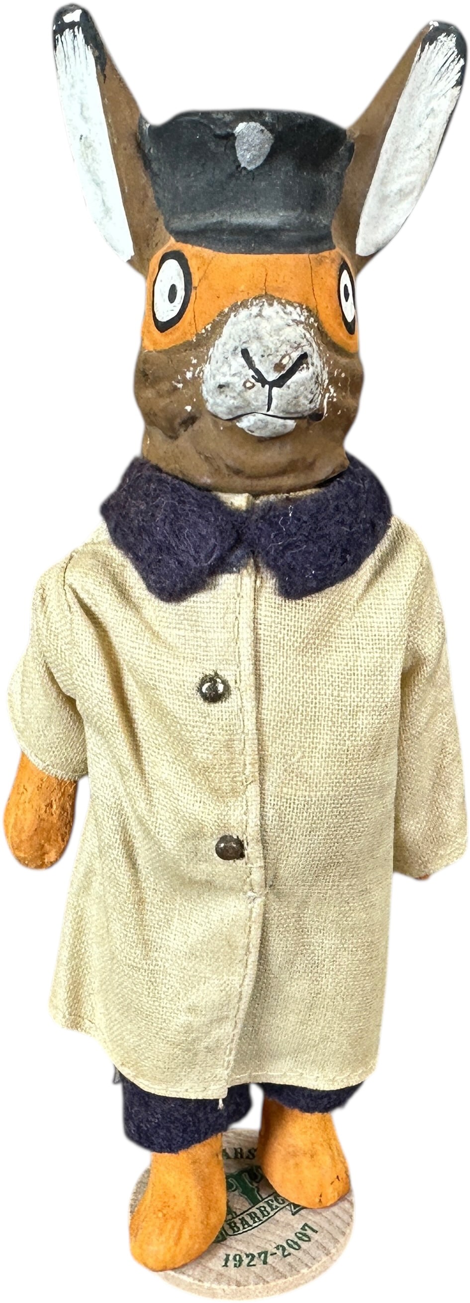 RABBIT CHAUFFER GERMAN CANDY CONTAINER: 344. RABBIT CHAUFFER GERMAN CANDY CONTAINER | Base is a wooden token. Good German Candy Container. Provenance: David Bausch Collection. | 7" h. | Glued crack on one ankle, (Excellent Condition) |